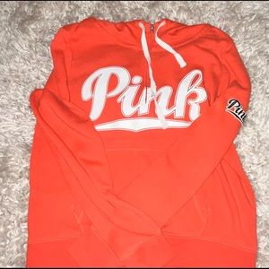 peach colored zip up